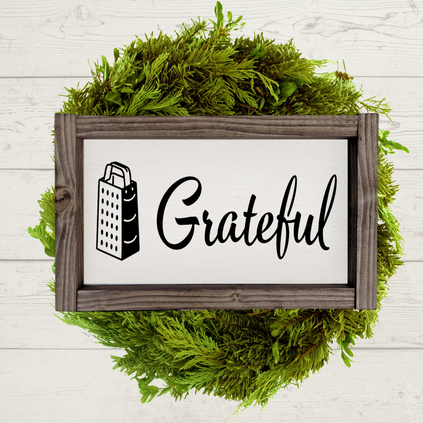 5x9 framed kitchen sign with a white background and black lettering that says grateful with a cheese grater