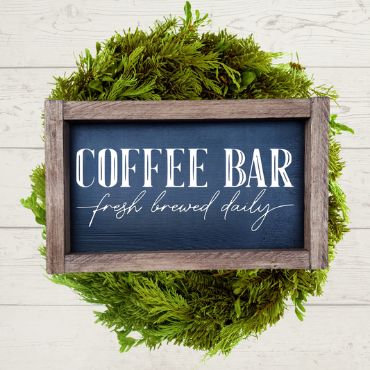 5x9 dark brown stained framed sign with a black background and white lettering that says coffee bar, fresh brewed daily.